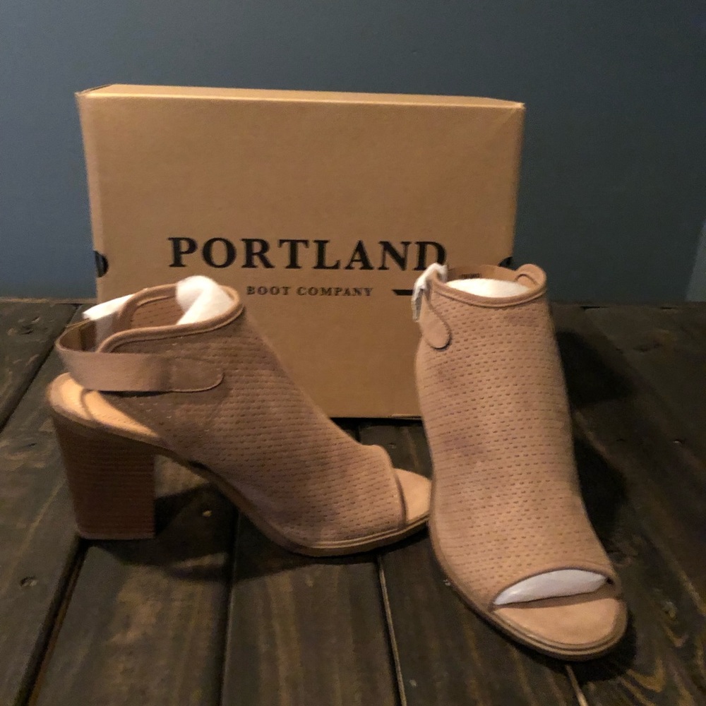 Brand new with tags and box open toe tan heels